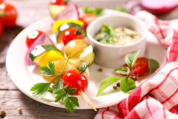 mixed vegetables on stick and dipping sauce- vegetarian barbecue