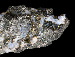 Iron pyrite with quartz crystal veins, over black. Close up of iron sulfide, FeS2, a mineral, also...