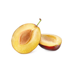 Halves of fresh ripe plum on white background