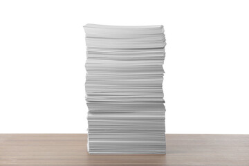 Stack of paper sheets on wooden table against white background