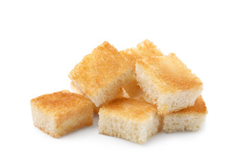 Pile of delicious crispy croutons on white background