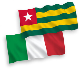 National vector fabric wave flags of Italy and Togolese Republic isolated on white background. 1 to 2 proportion.