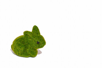 Green rabbit on a white background. Easter or 2023 Lunar New Year, Year of the Rabbit concept. Minimal composition.
