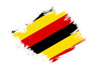 Uganda flag with abstract paint brush texture effect on white background