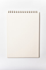 Blank paper page in notepad mock up on white background