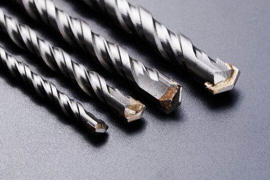 Metal drill bits for concrete, Boers for perforator isolated on black background