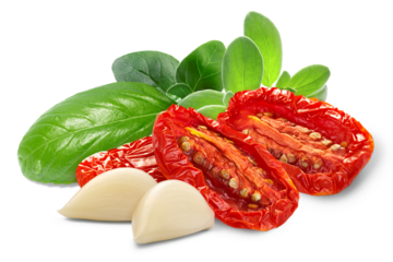 Dried or Sundried tomato halves with herbs and garlic  isolated png