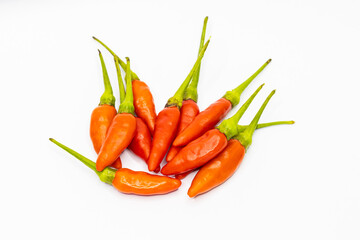 Group of red peppers on a white background separated close-up top view. isolated from background