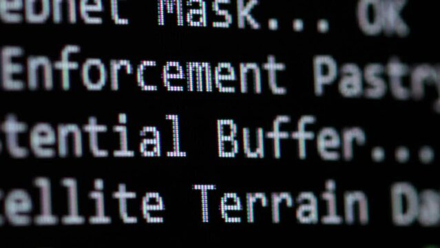 Code. Server logs on a monitor scroll by showing information related to scanning and network activity. File check and security. Concept background for video about technology and digital transformation