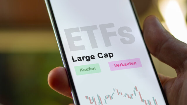 December 2022. An investor analyzes the largeCap ETF fund on phone screen Large Cap-ETFs. German text translated :Kaufen, Verkaufen = buy, Sell