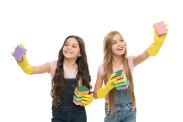 Cleaning together might be fun. Ready to help. Helpful kids cleaning with sponges. Girls protective...
