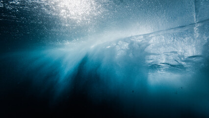 Underwater view of the breaking ocean wave