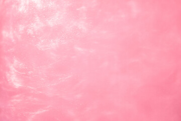 delicate pink background with sequins waves liquid motion