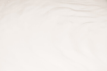 White liquid, waves, fluidity.