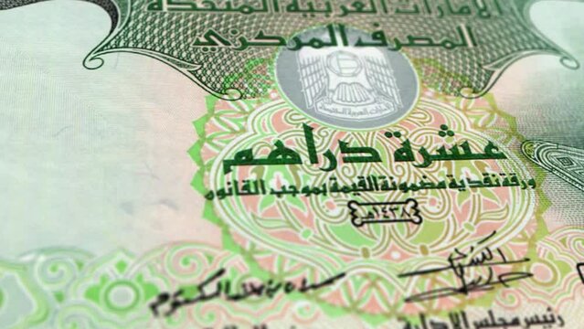 United Arab Emirates dirham 10 Banknotes, Ten United Arab Emirates dirham, Close-up and macro view of the Arab Emirates dirham, Tracking and Dolly Shots 10 UAE Dirham banknote Observe