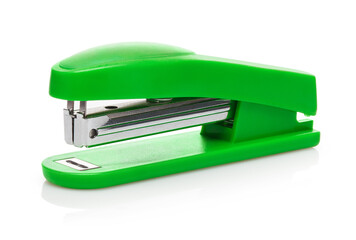 Green stapler, isolated on white background