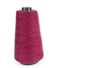 Knitting yarn for knitting on white background. red.