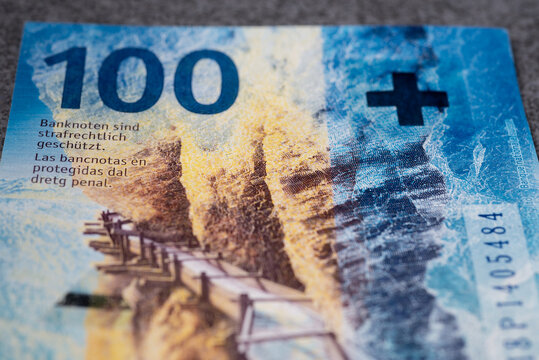 One hundred Swiss francs. Studio photography, with many small details.