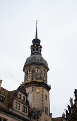 Obraz premium historic building tower with clock in another in the old town of dresden germany