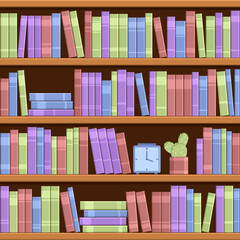 Four bookshelves with colorful books. Also on the shelf are a clock and a cactus. 