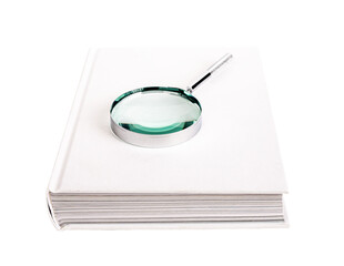 Book with magnifier, lens, glass, loupe on paper book in hardback isolated on white background