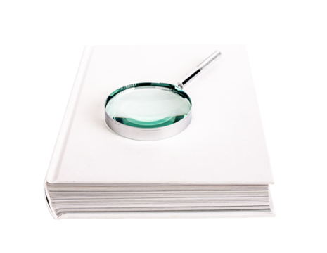 Book with magnifier, lens, glass, loupe on paper book in hardback isolated on white background