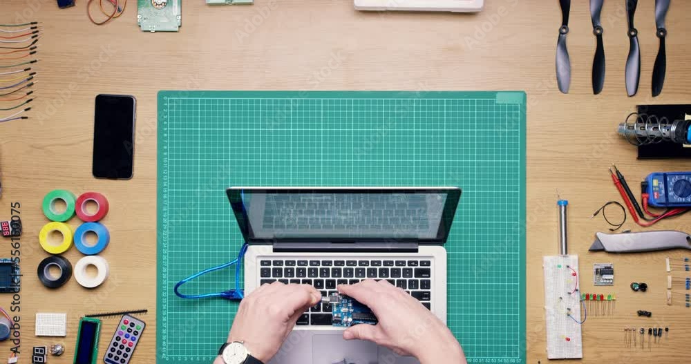 Aufkleber coding, software and top view of hand with laptop fixing, repair and working with digital hardware. 