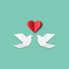 paper card with a heart and doves