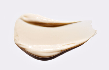 beige cream smear, cosmetics textures, foundation swatch