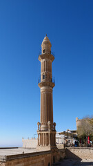 The minaret of an ancient mosque (Mardin, Turkey)