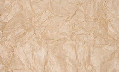 Texture of brown crumpled craft paper, full frame