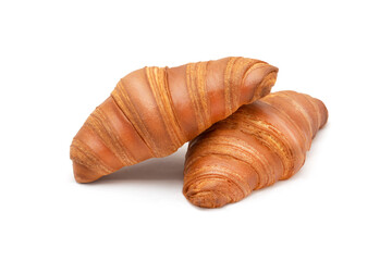 French croissants isolated on a white background. Fresh pastries