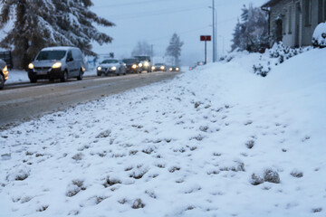 RABKA ZDROJ, POLAND - DECEMBER 16, 2022: Traffic jam on the road caused by snowstorm.
