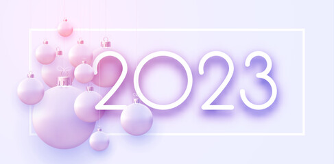 2023 sign with light pink hanging baubles.