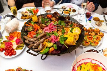 Assorted meat and vegetables, fried in a wok