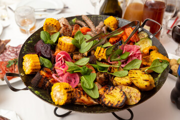 Fototapeta na wymiar Assorted meat and vegetables, fried in a wok