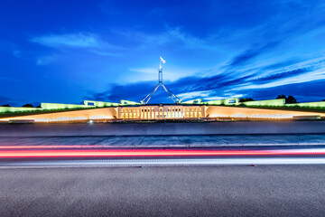 Stunning cityscape of the Parliament House Canberra at sunset.