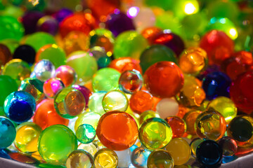 Fototapeta na wymiar Colorful hydrogel balls as textured background