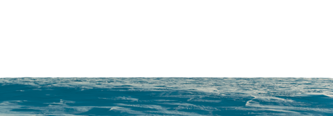 A hilly field covered with snow on a sunny day