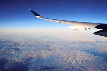 Fototapeta na wymiar cloudy sky view from airplane window