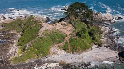 Aerial shot of the picturesque  Isla Maiquillahue in the Pacific Ocean of Chile