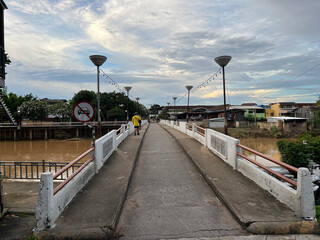 Small Bridge over the Wang river at sunset in Lampang, Thailand