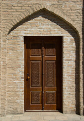 old wooden door in a wall