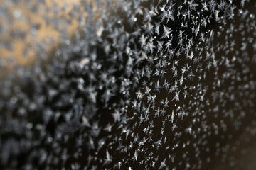 frosty stars. beautiful frosty pattern on a black background.
