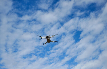 isolated drone on sky background