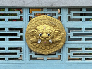 protective lion symbol at wall of thailand home