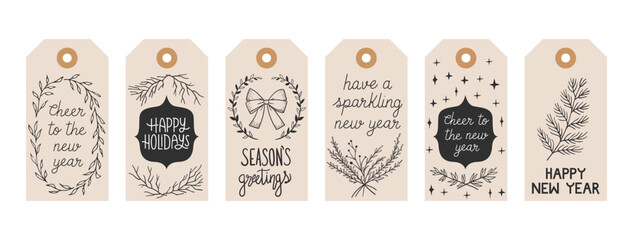 Set gift tags set with hand drawn doodles leafs and lettering. Vector hand drawn illustration