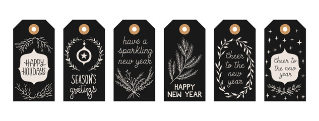 Set gift tags set with hand drawn doodles leafs and lettering. Vector hand drawn illustration