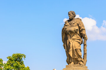 Obraz premium Ancient medieval sculptures on the Charles Bridge. Background with selective focus