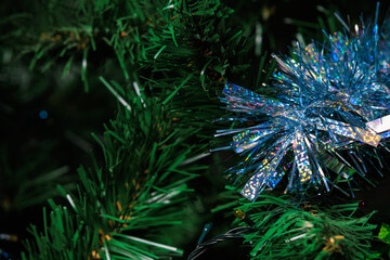 An artificial Christmas tree. Preparation for the holidays. Background